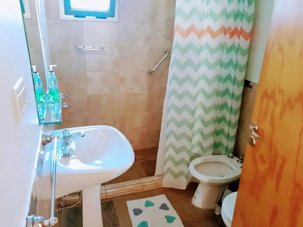 Bathroom with shower and bidet
